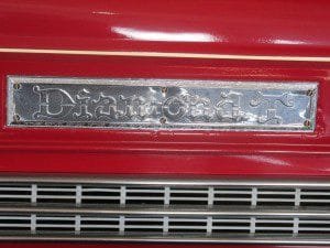 Stylish Diamond T nameplate on side of hood